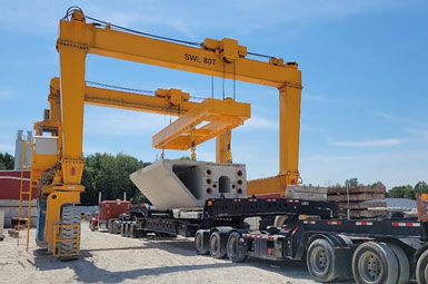 automated-straddle-carrier-used-in-precast-concrete-yard